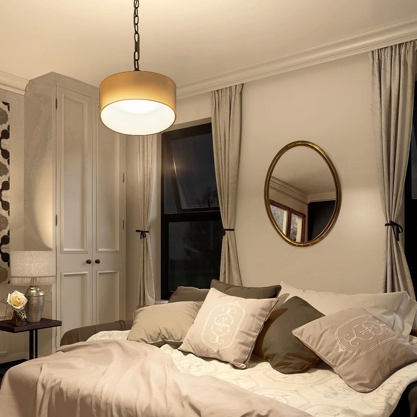 Luxury bedroom mockup featuring a neatly made bed with patterned bedding, neutral pillows, and a round wall mirror above.