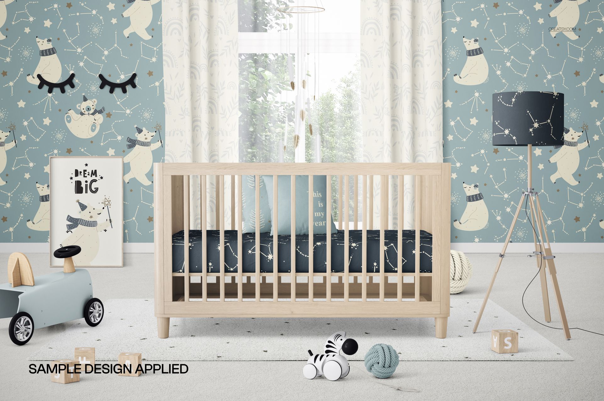 PSD mockup showing a baby crib, decorative lamp, toy car, and framed artwork in a cozy kids room setting.