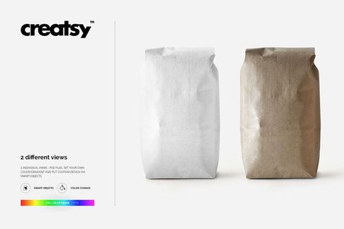 PSD mockup showing two upright paper bags, one in white and one in kraft brown, on a clean white surface.