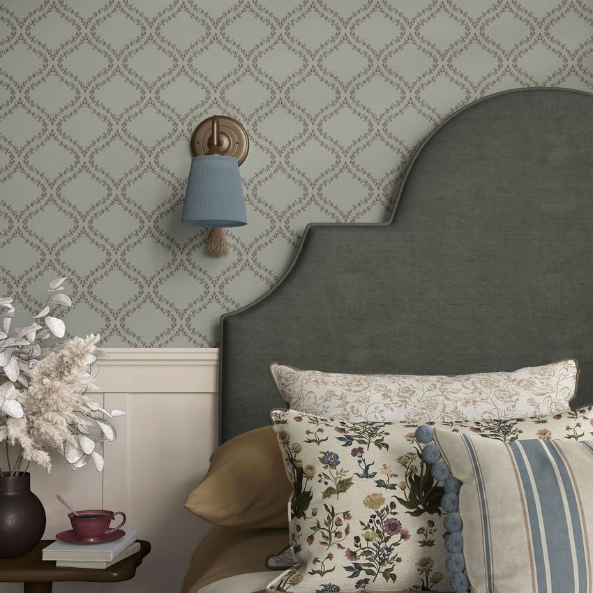 Bedroom pillows, headboard, and wallpaper mockup showing a patterned wall, upholstered headboard, and assorted pillows.