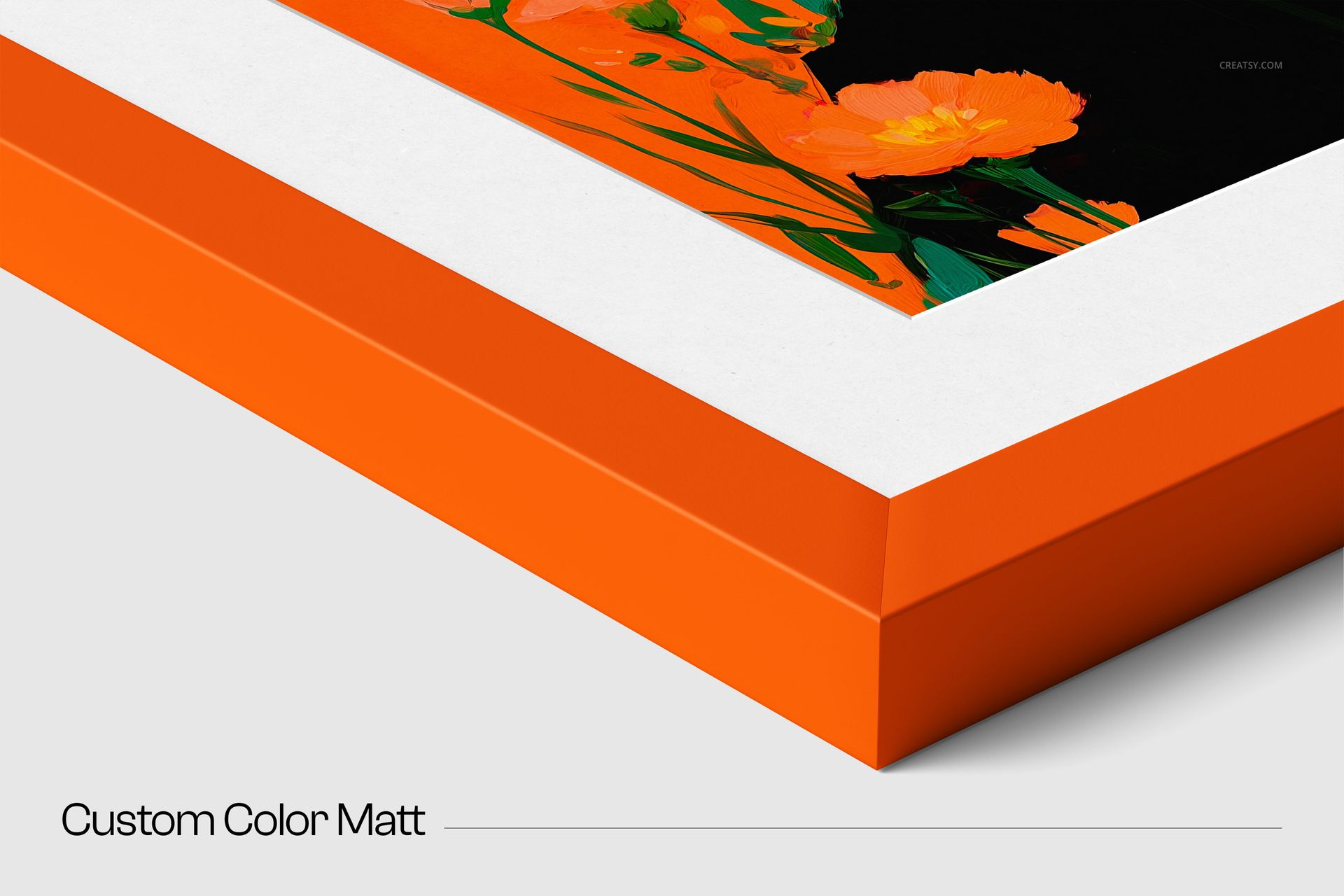 Close-up view of a solid wooden frame mockup with bright orange edges, white matte border, and floral artwork.
