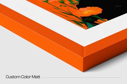 Close-up view of a solid wooden frame mockup with bright orange edges, white matte border, and floral artwork.