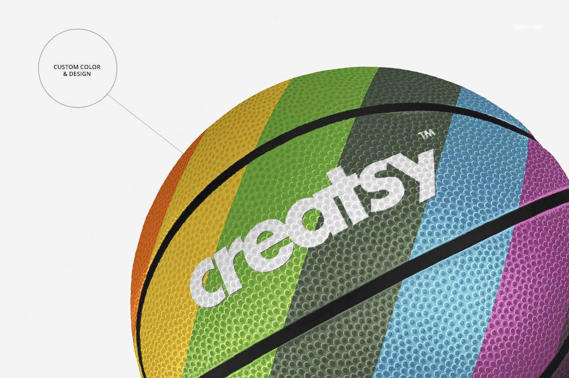 Colorful basketball ball mockup displaying vibrant diagonal stripes and embossed branding, viewed from a close angle.