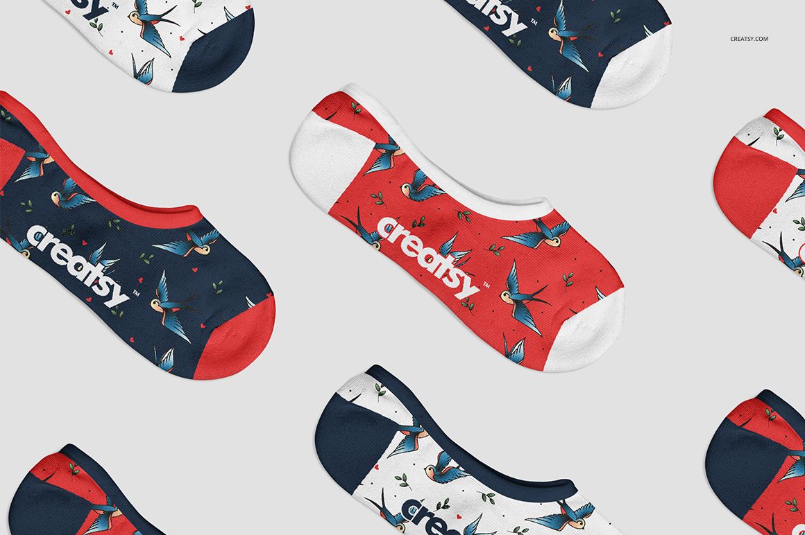 No show socks mockup featuring multiple pairs in red, navy blue, and white with bird patterns, top view on light background.