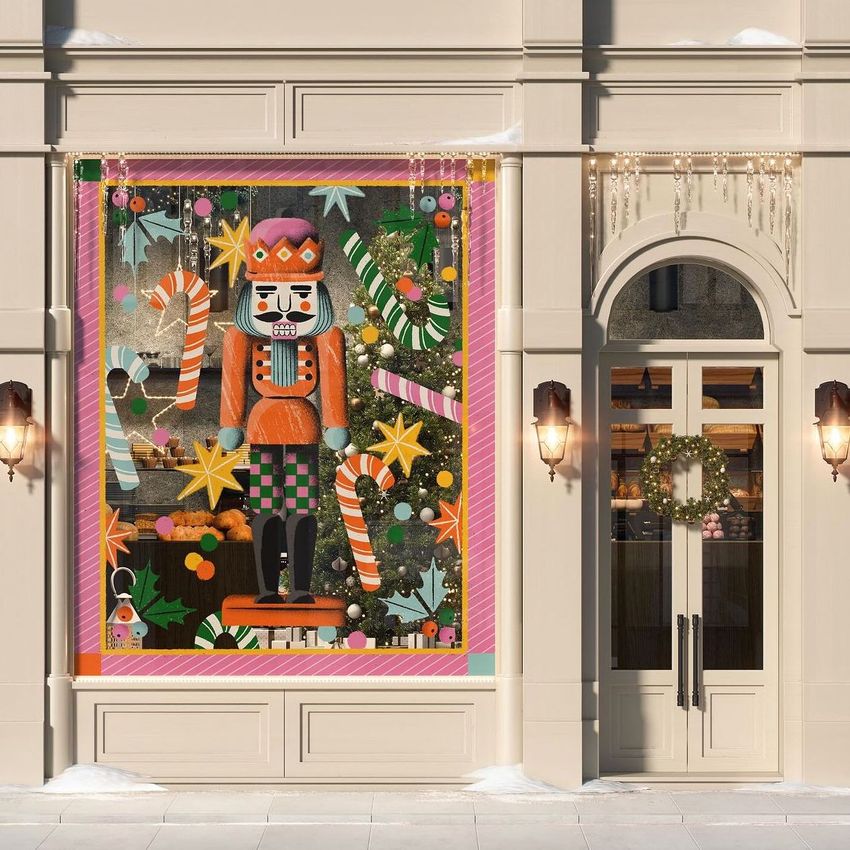 Christmas storefront mockup featuring a large window display with a colorful nutcracker illustration, candy canes, stars, and festive decorations.