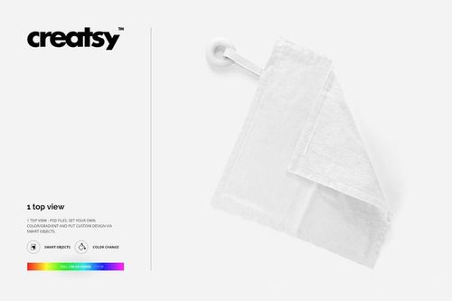 Top view of a white teething blanket with a ring and tag, displayed on a plain white background in a mockup scene.