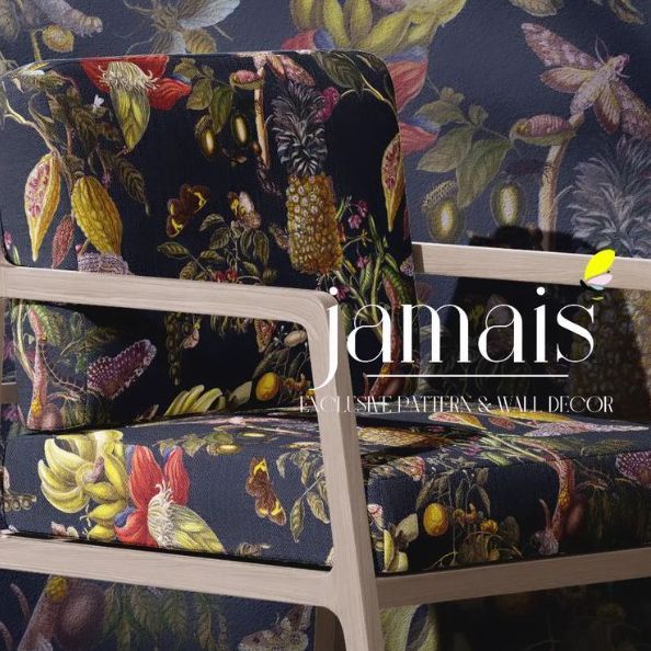 Lounge chair mockup with light wood frame and dark fabric upholstery featuring a colorful botanical pattern, set against a matching patterned wall.