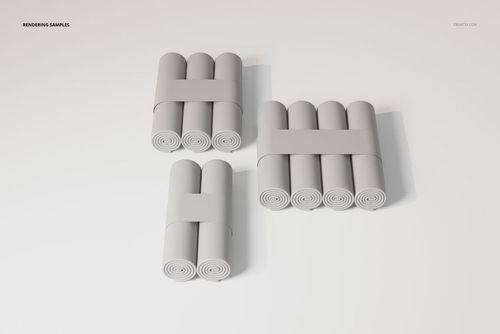 Three sets of changing pad paper rolls arranged in rectangular bundles, viewed from above on a white surface.