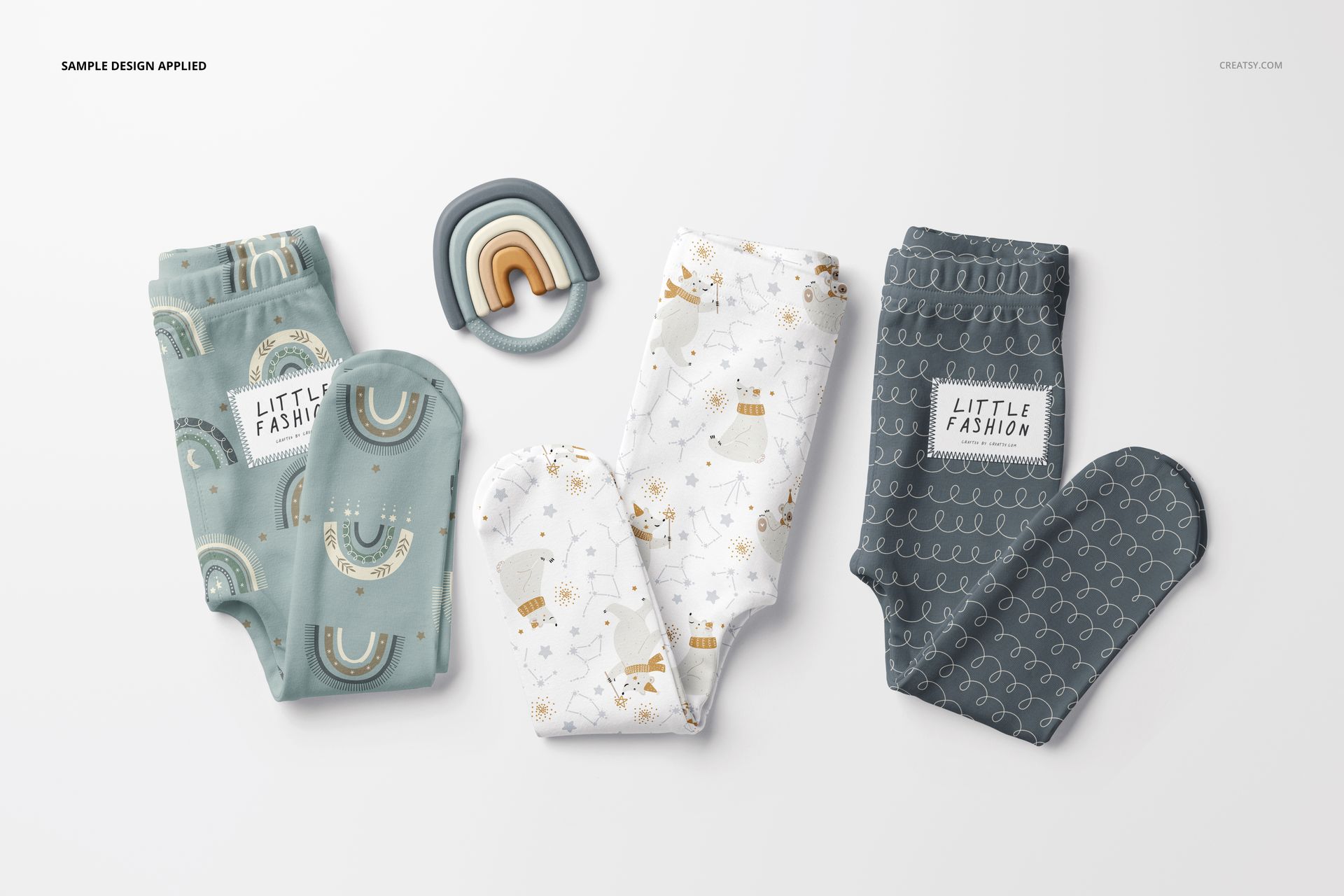 Footed baby leggings mockup set displayed in three color variations, shown from a top view on a white surface.