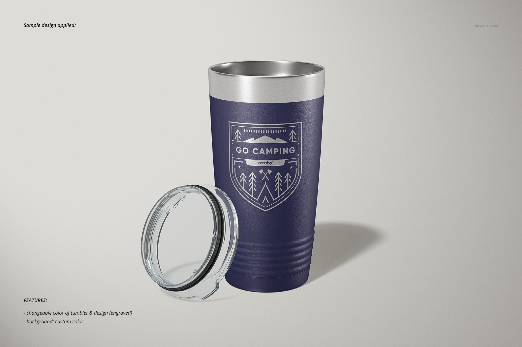 Front view of a 20oz stainless steel tumbler mockup with a dark blue exterior and camping-themed design, lid placed beside.