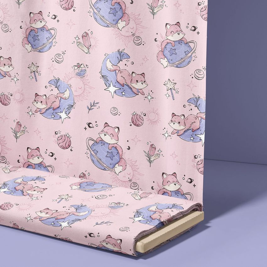 Fabric bolt mockup featuring pink material with whimsical foxes, moons, and stars in pastel blue and purple on a solid background.