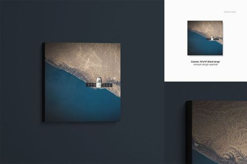 Front view of a rectangular canvas print mockup with a satellite image, displayed on a dark wall background.