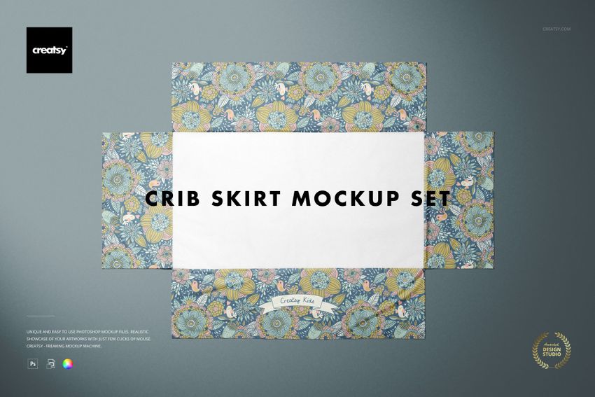 Crib skirt mockup displayed flat on a gray background, featuring a floral pattern in blue, yellow, and pink tones.