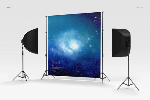 Custom printed backdrop mockup set featuring a cosmic blue pattern, shown with two softbox lights in a studio setup.