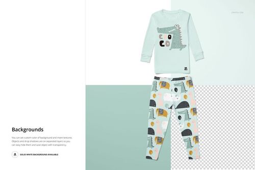 Kids long sleeve pajama set mockup with light blue top featuring a crocodile print and patterned pants, front view.