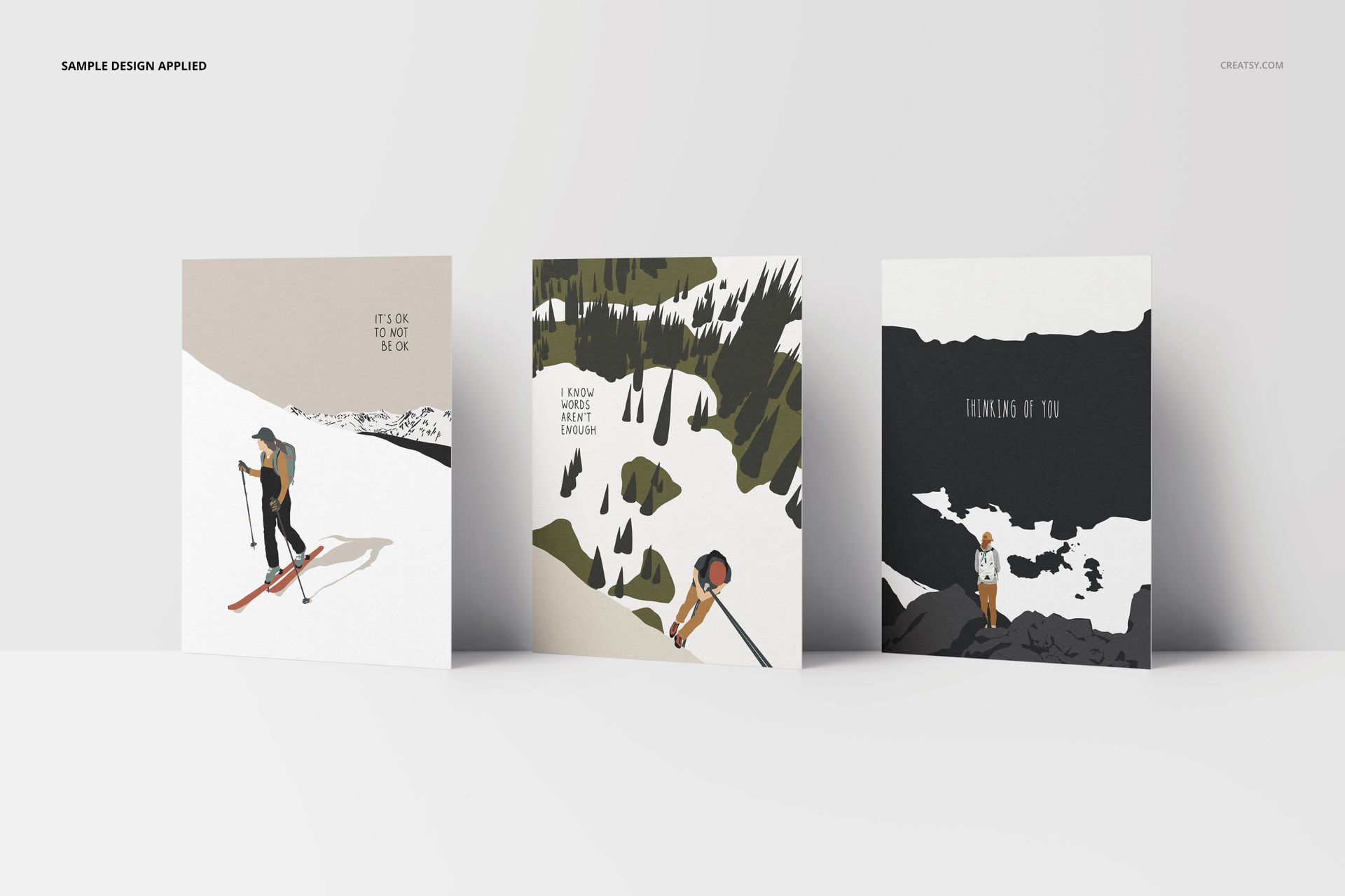 A2 cards mockup set showing three square cards with illustrated nature designs, arranged in a row on a white background.