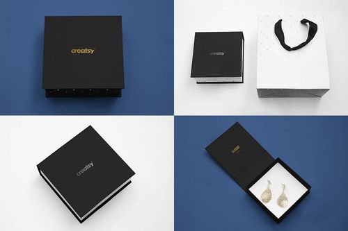 Jewelry box mockup set showing black and white square boxes, one open with earrings inside, on blue and white backgrounds.