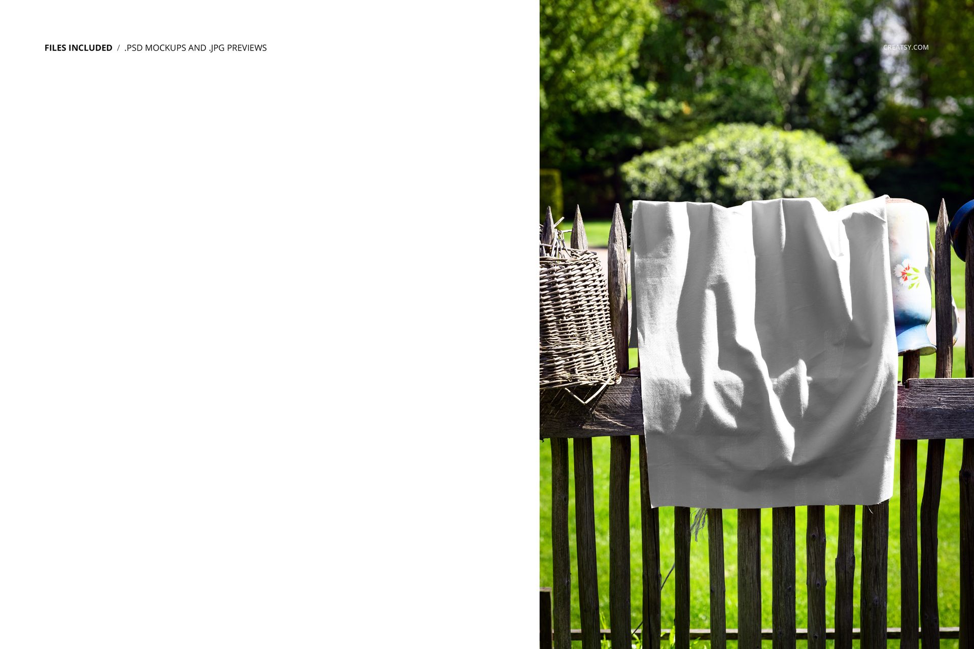 PSD mockup featuring a plain fabric hanging on a weathered wooden fence, surrounded by lush outdoor scenery.