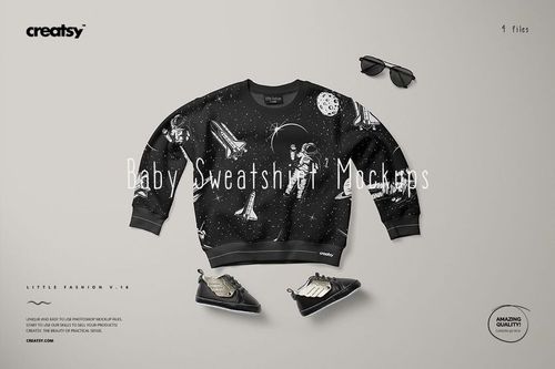 Black baby sweatshirt mockup featuring astronaut and space graphics, laid flat with sneakers and sunglasses nearby.