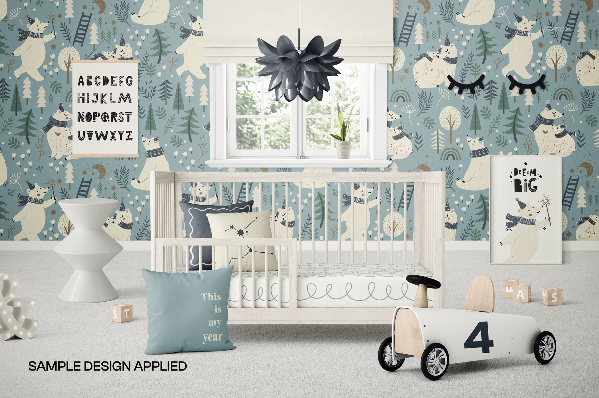 PSD mockup featuring a baby crib in a kids room, with decorative pillows, toys, and a forest-themed wall design.
