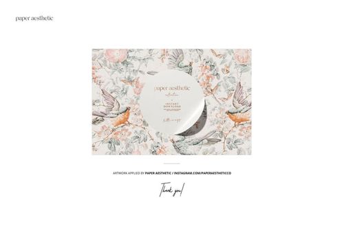 Front view of a grommet curtain mockup scene with a soft floral and bird pattern in muted pastel colors.