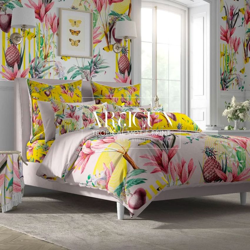 Cottage style bedroom bedding mockup showing a bed with vibrant floral and pineapple patterned sheets and pillows in a bright room.