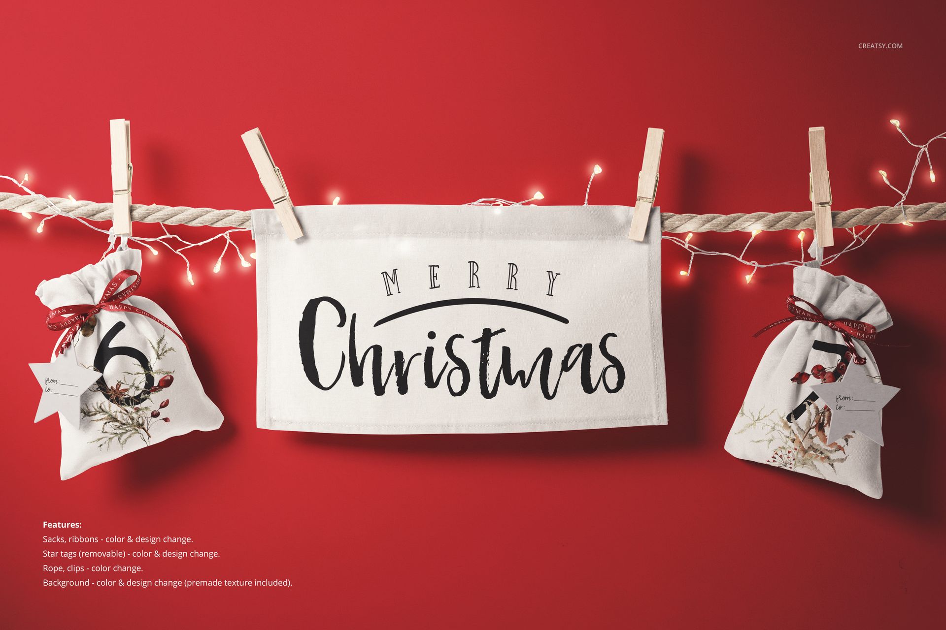 PSD mockup showing festive drawstring sacks and a decorative cloth banner clipped to a rope, set against a red backdrop.