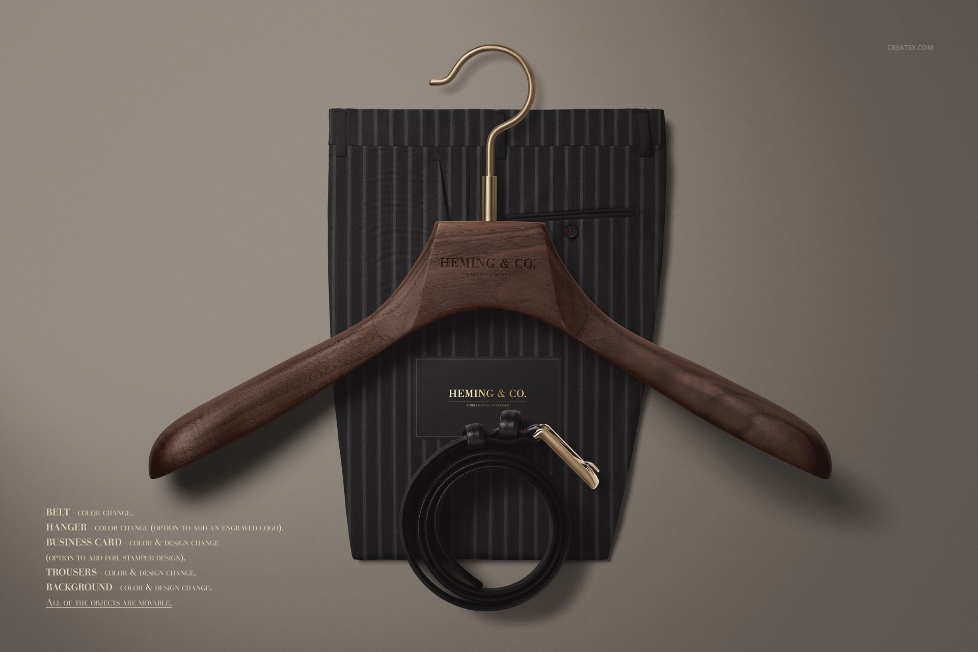 Top view of a men's fashion mockup set featuring a dark wood hanger, pinstriped pouch, coiled black belt, and card.
