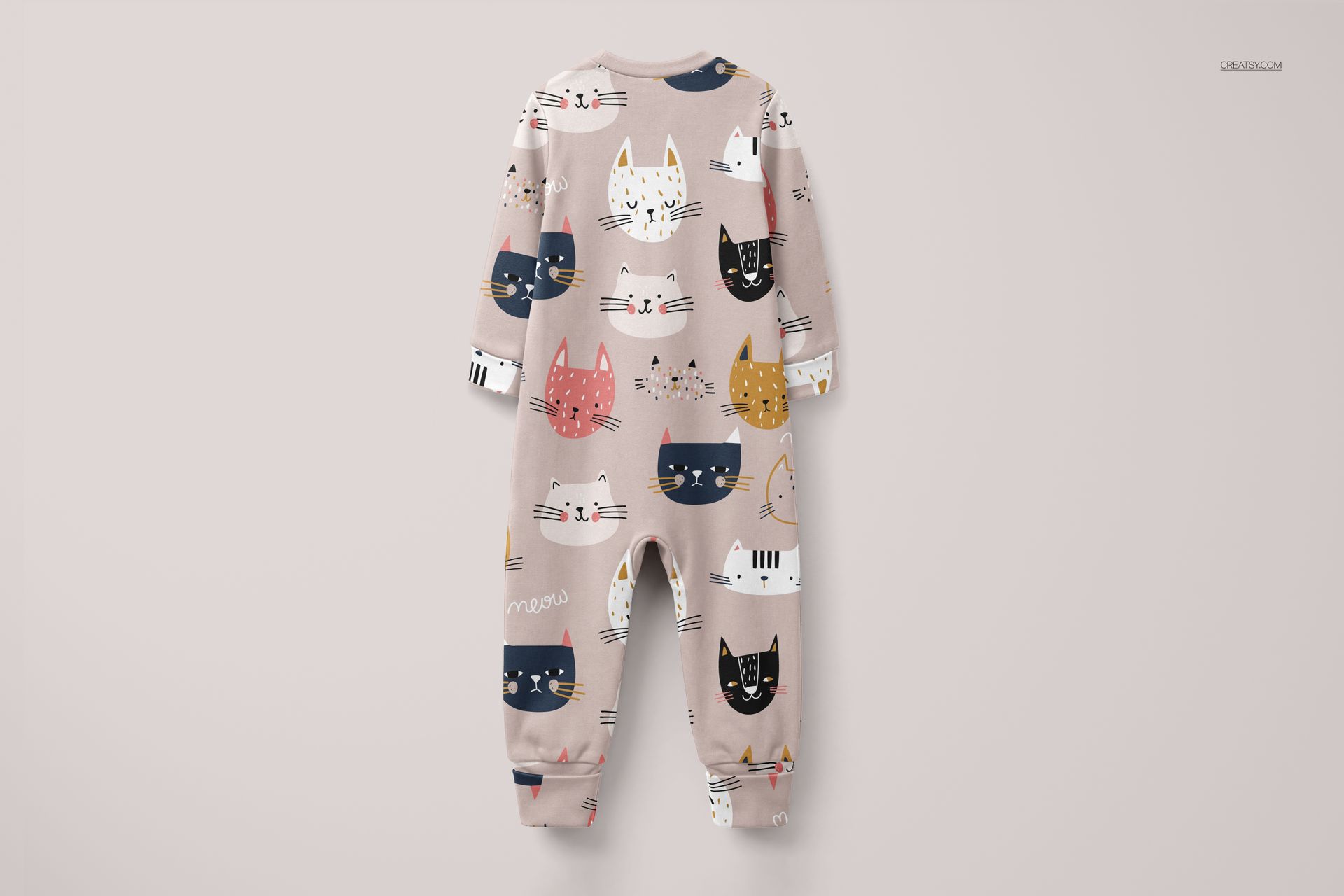 Front view of a baby sleepsuit mockup with long sleeves, featuring a pastel background and playful cat illustrations.