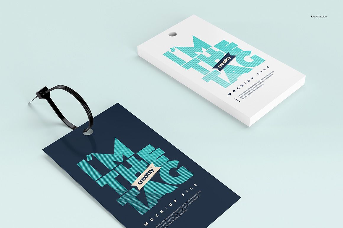 PSD mockup showing a pair of cable tie tags in contrasting colors, arranged on a pale background with soft shadows.