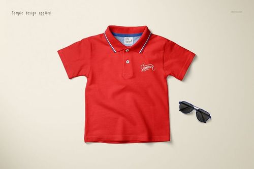 Red kids polo shirt mockup displayed from a top view on a light beige background with sunglasses beside it.