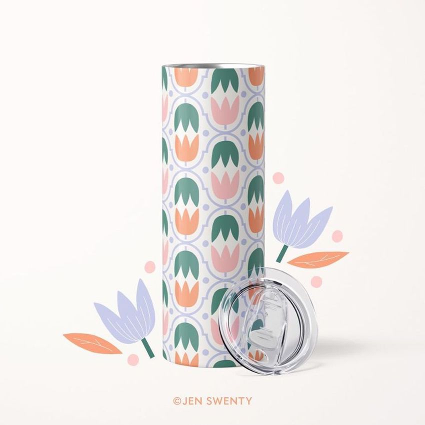 20oz skinny tumbler mockup with a geometric tulip pattern in pink, green, and orange, shown upright with a clear lid beside it.
