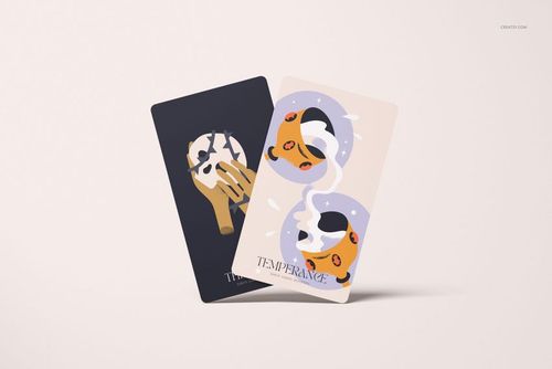 Tarot cards mockup with one card in dark tones and one in light, both featuring stylized designs on a plain surface.