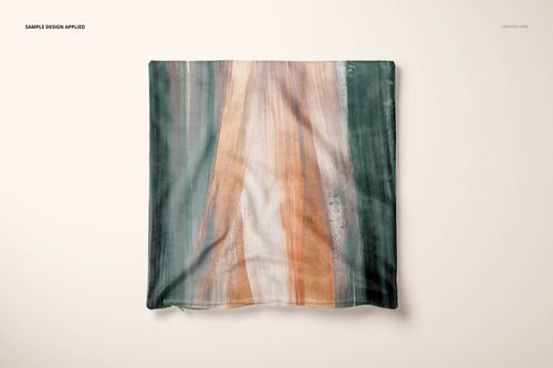 Velvet cushion cover mockup featuring a square shape and multicolored abstract design, displayed flat on a neutral surface.