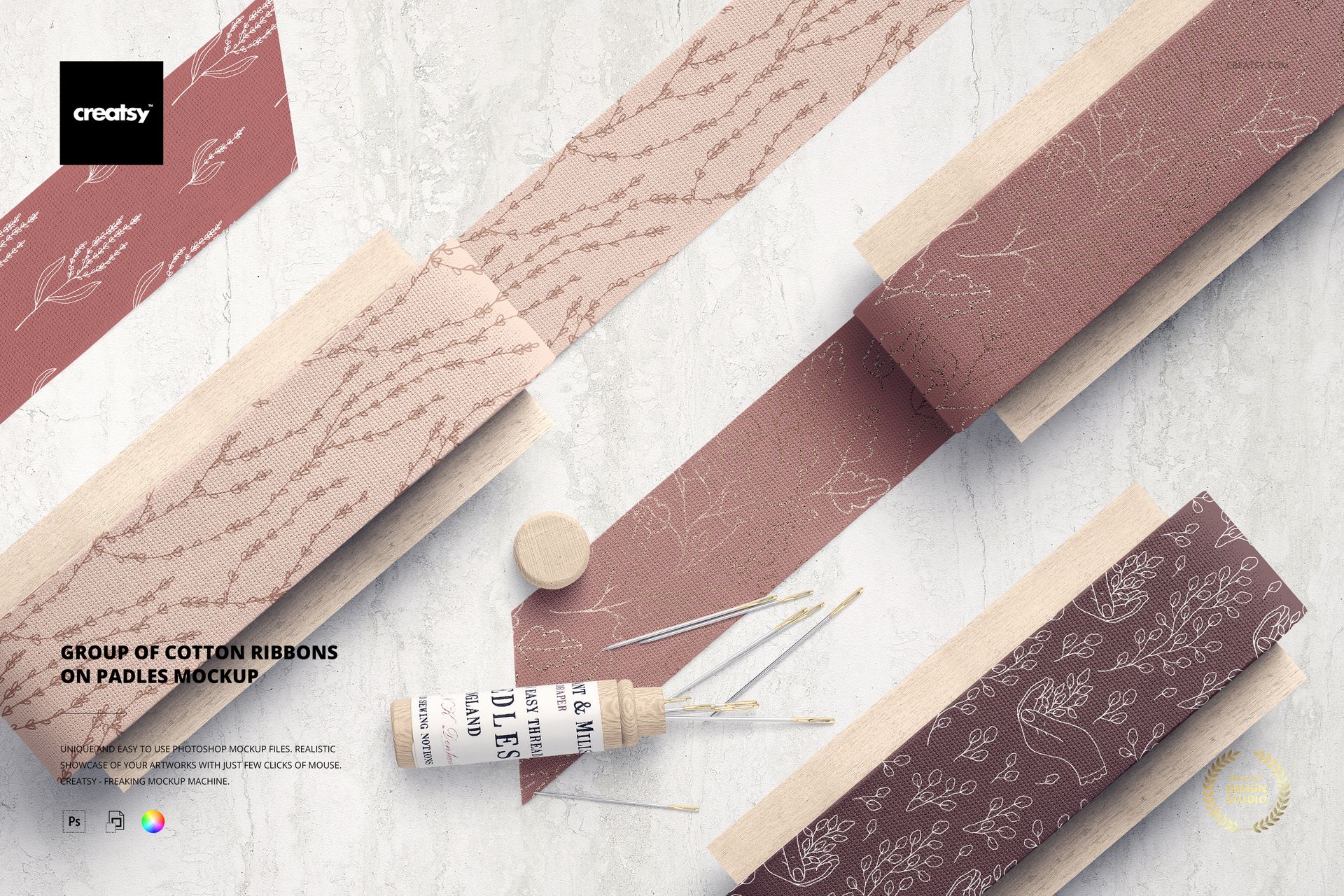 PSD mockup showing a group of patterned cotton ribbons in soft pink and brown, placed on wooden paddles with sewing props.