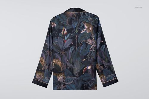 Long-sleeve silk pyjama top mockup shown from the back, featuring a dark botanical pattern with gold accents.