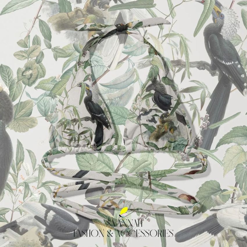High waisted bikini mockup featuring a tropical bird and foliage pattern, displayed on a matching botanical background.