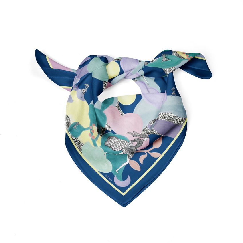 Silk scarf mockup featuring a folded scarf with abstract pastel and blue patterns, displayed on a white background.