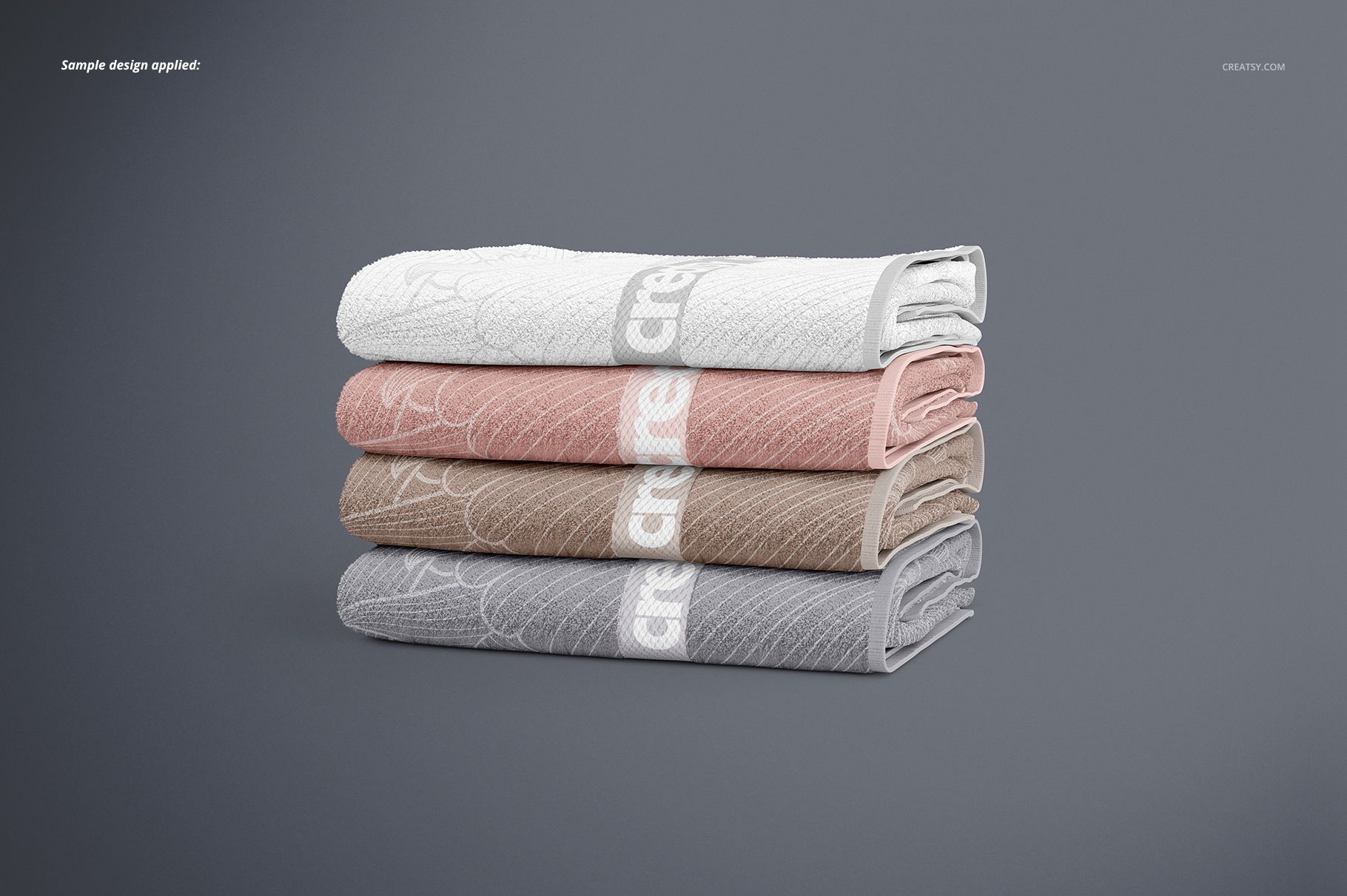 PSD mockup featuring a side view of neatly stacked bath towels in pastel shades and minimal design accents.