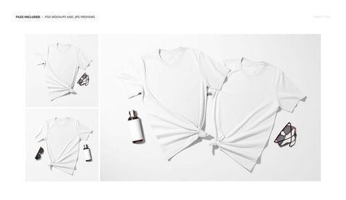 PSD mockup showing a pair of white tied t-shirts laid flat with a bottle and glasses as props, photographed from above.