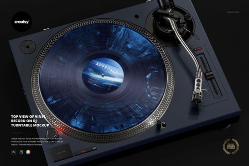 PSD mockup featuring a close-up top view of a vinyl record spinning on a modern DJ turntable with metallic accents.