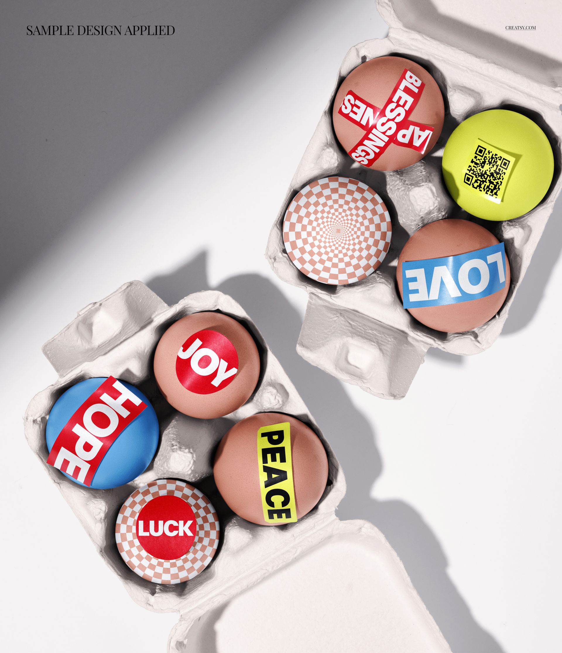 PSD mockup showing Easter eggs in open cartons with vivid designs, including checkerboard patterns and positive messages.