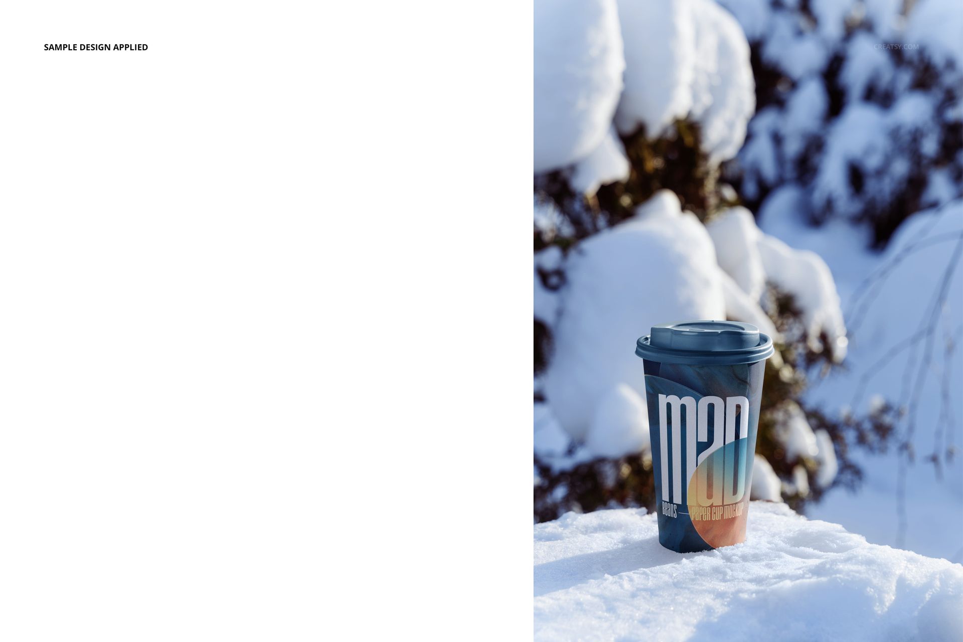 Winter-themed PSD mockup showing a paper cup with a lid resting on snowy ground, trees in the background.