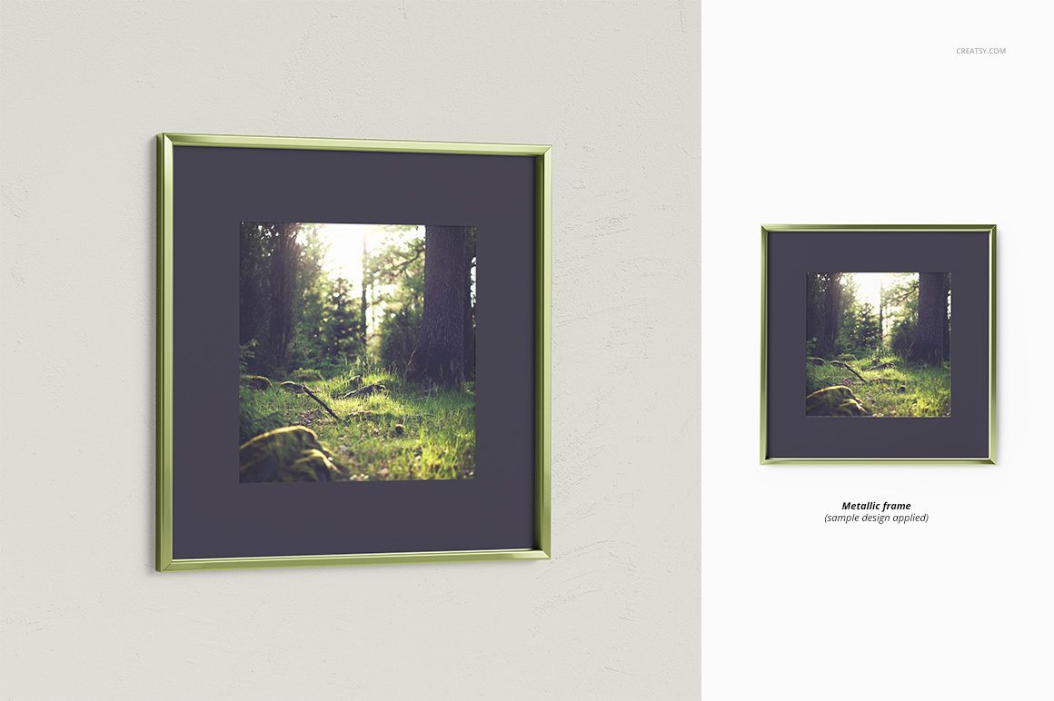 Thin metallic picture frame mockup with a forest photograph, shown from the front on a light wall background.
