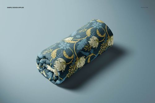 Rolled polyester fabric featuring a blue and yellow floral pattern, displayed on a light gray surface in a mockup scene.