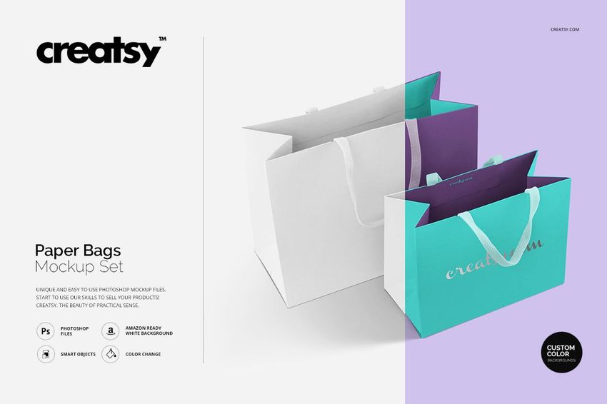 Mockup of two paper bags with handles, featuring white and turquoise exteriors and purple inside, placed side by side.