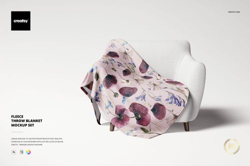 Floral fleece throw blanket mockup displayed on a white chair, featuring pink and purple tones in a minimal setting.