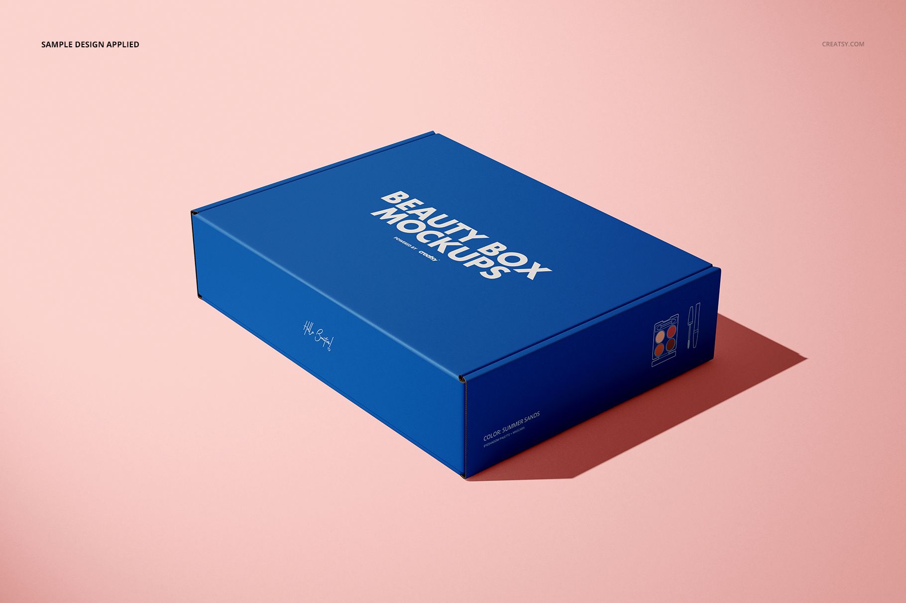 Rectangular mailing box mockup in blue with white text, shown from an angled top view on a light pink background.