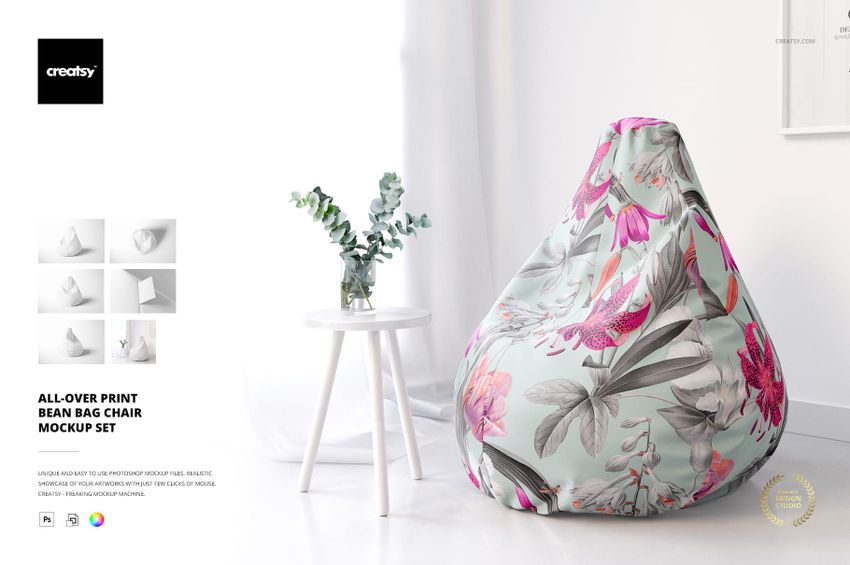 All-over print bean bag chair mockup featuring soft green fabric with pink and purple botanical design, front view in modern interior.