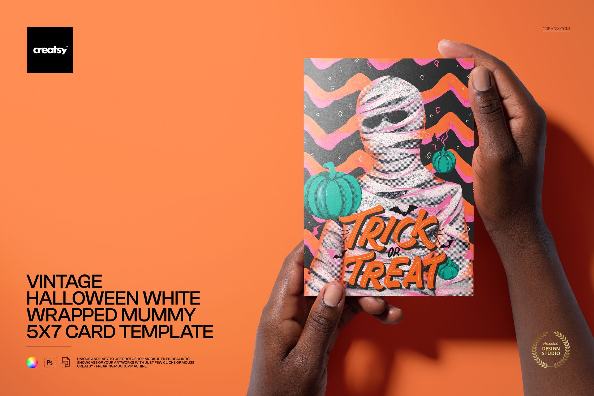 Hand holding a 5x7 card mockup with a vintage mummy illustration, pumpkins, and trick or treat text on a colorful backdrop.